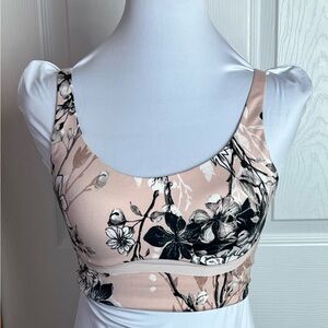 Victoria’s Secret floral sports bra 32D with adjustable straps.